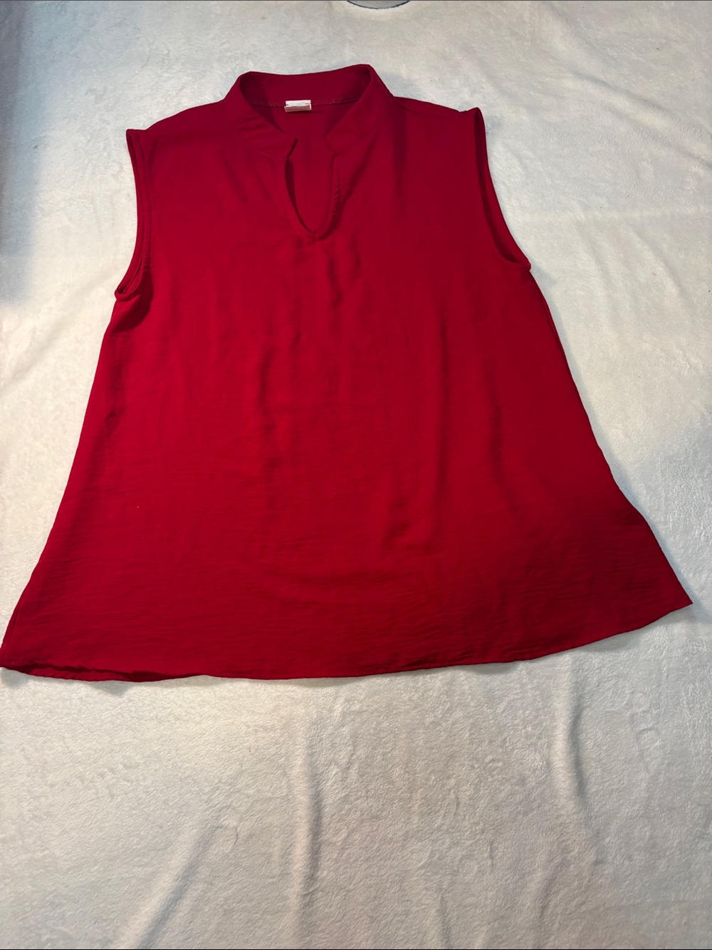 Blouse in Red. Sleeveless with Round Neck. Small “V” shape in Front Large NWOT